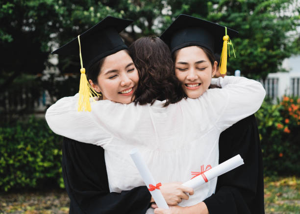 istock graduate hugging her mother. 948574984