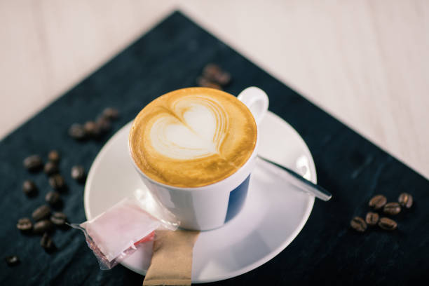istock Espresso coffee arranged with heart shape 948580240