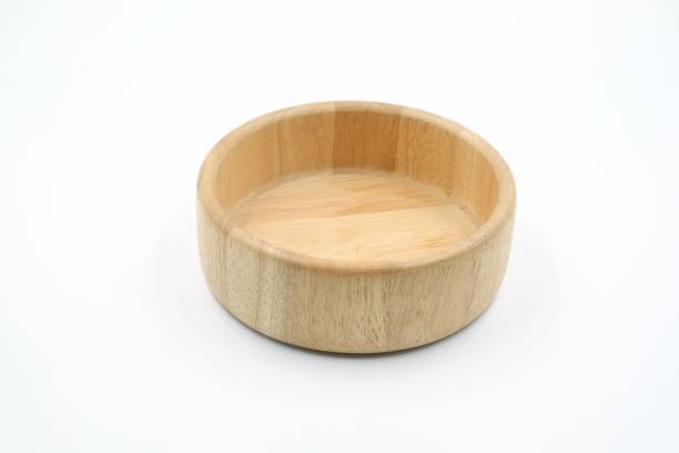 istock Round wooden tray on white background 948588160