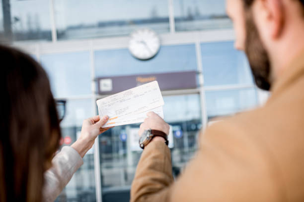 istock Holding tickets near the airport 948588580