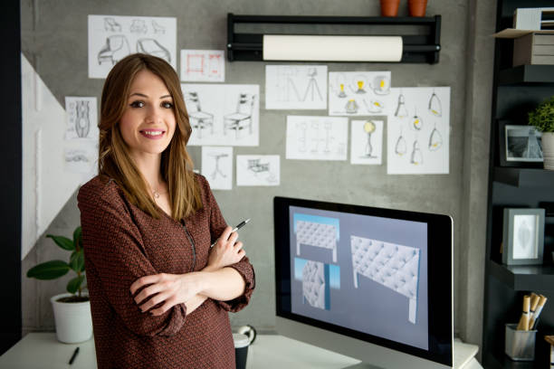 istock Smiling young women in her office 948590954