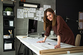 Smiling designer in her studio