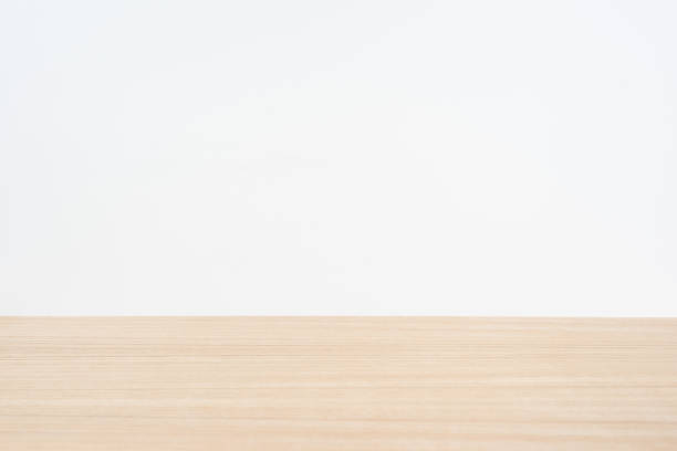istock Empty wood table top isolated on white background for display or montage product 948606260