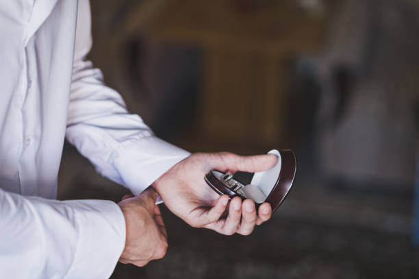 istock The man is holding a box with wedding rings 9983. 948617542