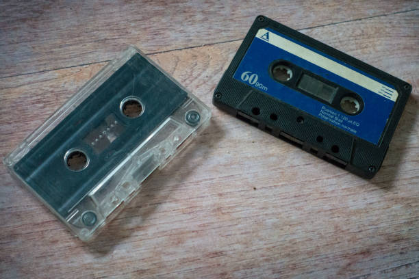 istock Old cassette tapes with a wooden background 948628648