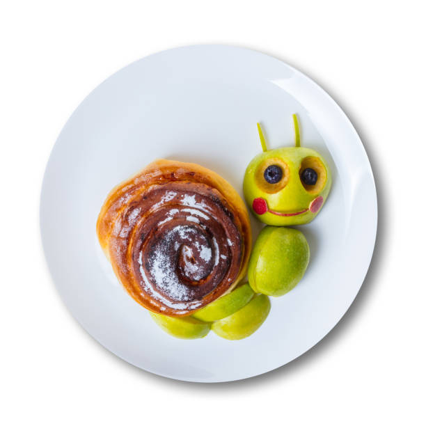 art food for children, snail from green apple and bun