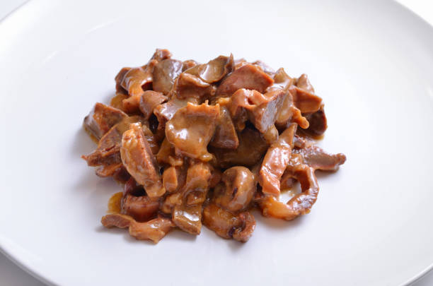 istock Chicken gizzards with sour cream and soy sauce. 948635888