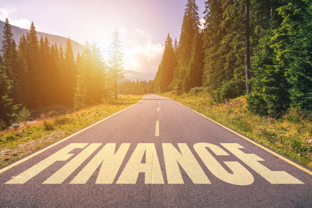 istock Finance word written on road in the mountains 948636288