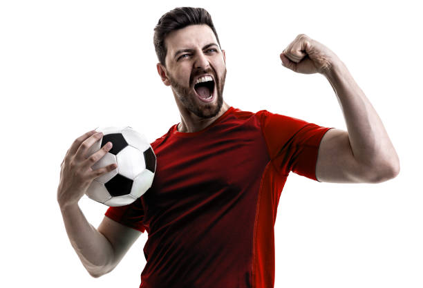 istock Fan / Sport Player on red uniform celebrating on white background 948647446