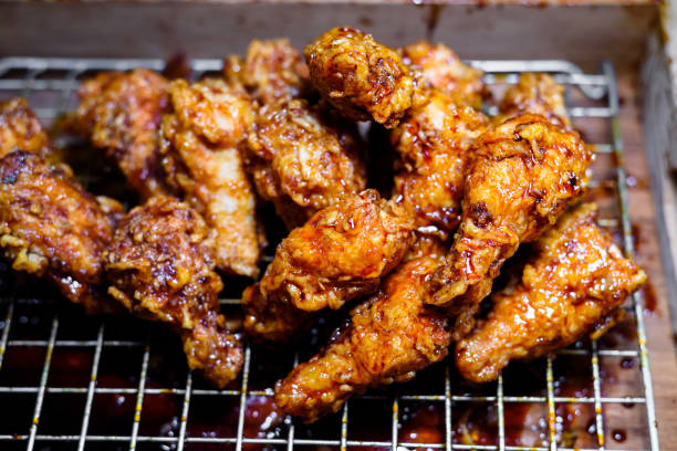 istock Fried chicken with barbeque sauce , Spicy Buffalo Wings 948648474