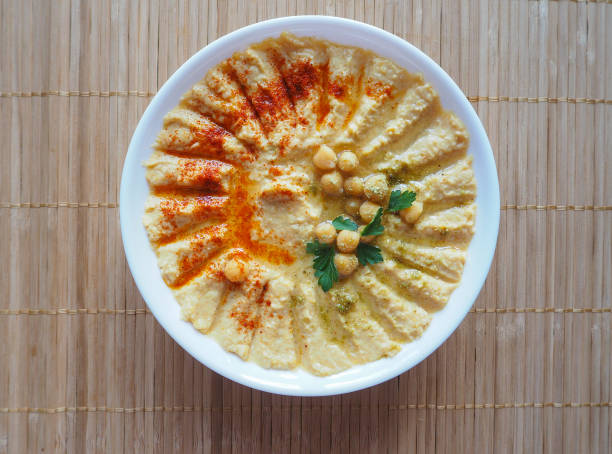 istock Dishes of chickpeas. Hummus. Lean middle Eastern cuisine. 948654908