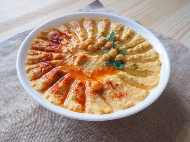 istock Dishes of chickpeas. Hummus. Lean middle Eastern cuisine. 948654970