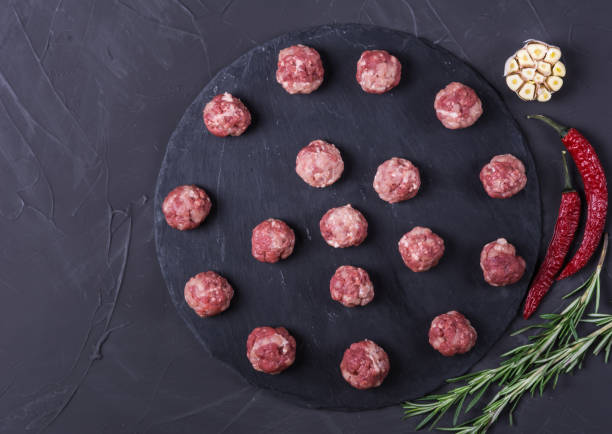 istock Homemade raw meatballs 948655084