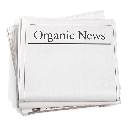 Wrinkle and textured natural newsprint with headlines Organic News