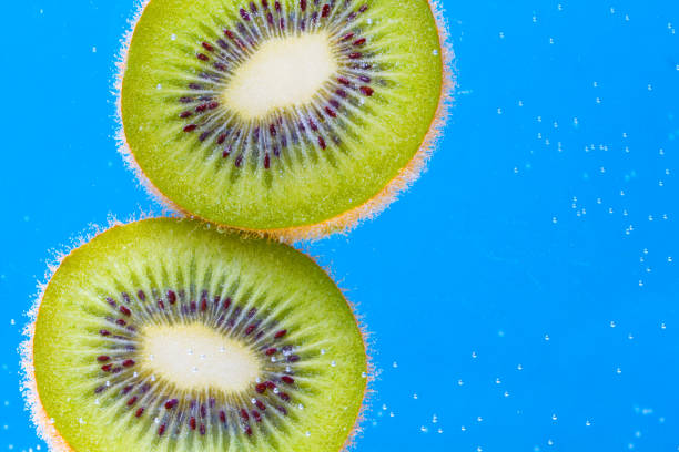 istock kiwi fresh water bubbles bright blue background 948664336