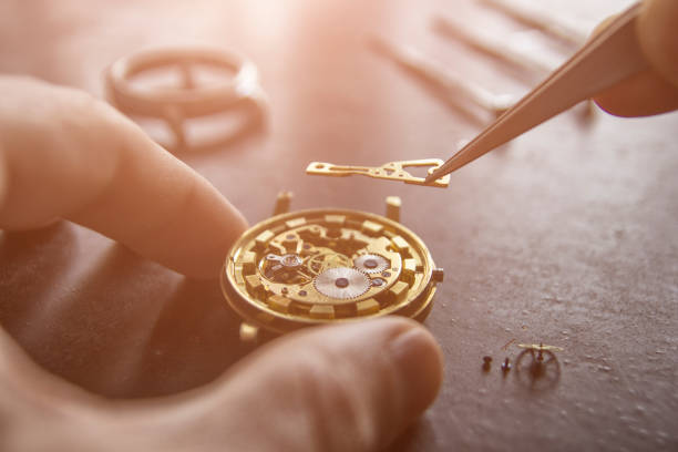 istock Process of installing a part on a mechanical watch, watch repair 948666974
