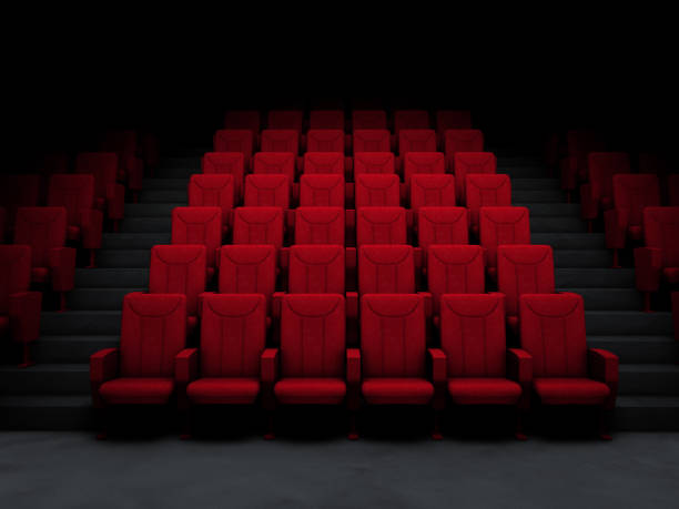 Cinema Salon and Red Seats Movie theater in the dark. seat stock pictures, royalty-free photos & images