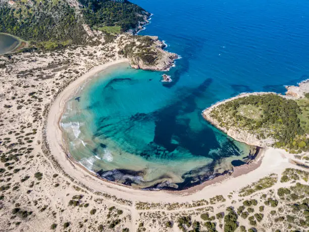 Photo of Aerial view of Voidokilia Beach, a popular beach in Messinia in the Mediterranean area