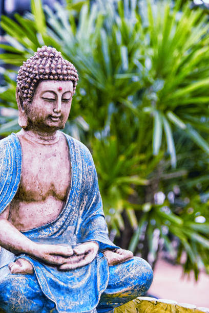istock Buddha statue in the garden. 948708012