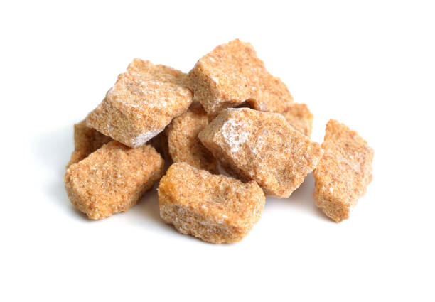 istock Brown cane sugar. Isolated on white background. 948711868