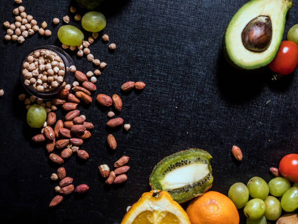 istock close up raw nuts seeds and fresh fruits 948716548