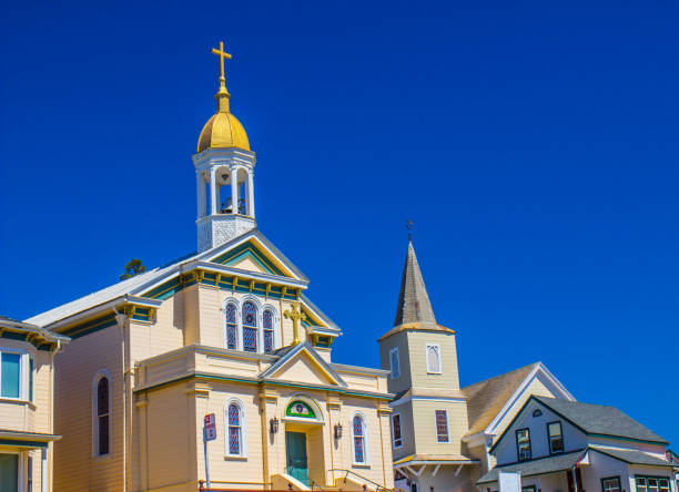 istock Two Churches With Belfry, Spire & Crosses 948725746