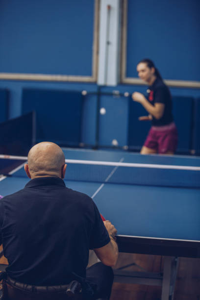 istock Man and woman playing table tennis 948729720