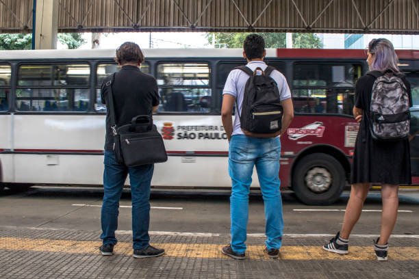 Sao Paulo, Brazil, January 03, 2017: View of people waiting for urban buses in Santo Amaro Bus Terminal, Sao Paulo, Brazil