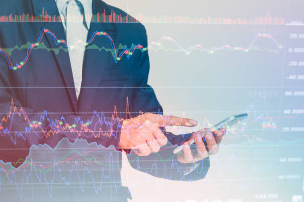 istock Double exposure Businessman finger touching smart phone 948743512
