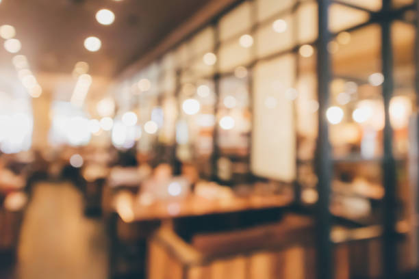 istock Restaurant cafe or coffee shop interior with people abstract defocused blur background 948751890