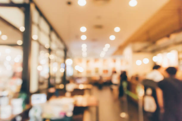 istock Restaurant cafe or coffee shop interior with people abstract defocused blur background 948751894