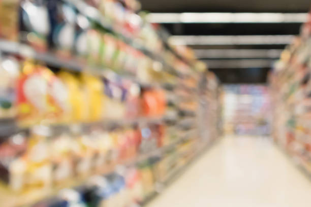 istock Abstract blur supermarket aisle defocused background 948751900