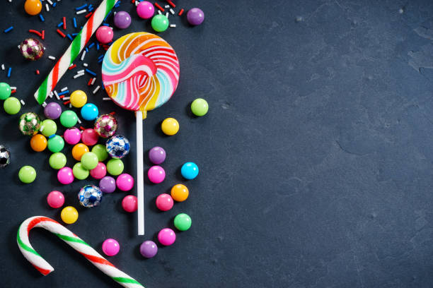 istock Colorful chocolate candies and lollipops 948752272