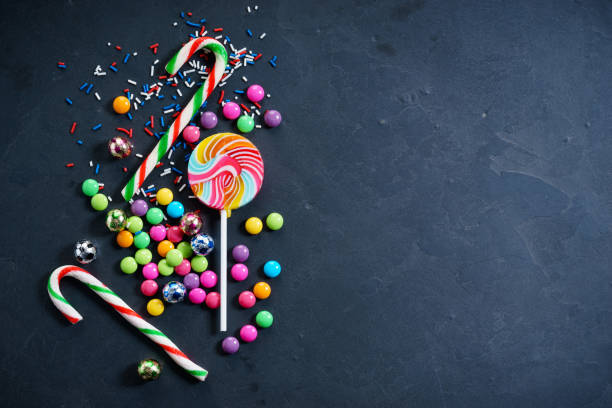 istock Colorful chocolate candies and lollipops 948752282