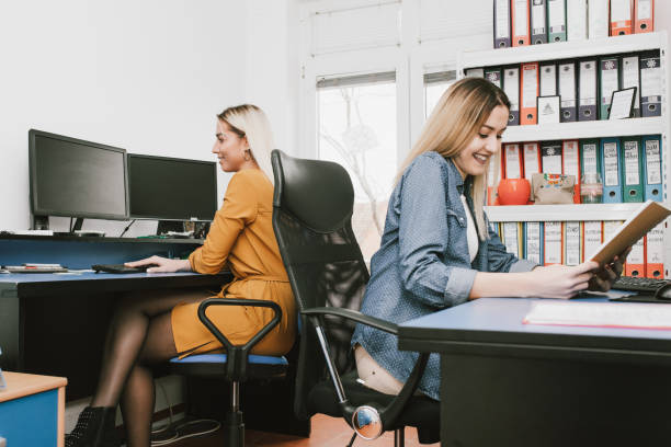 istock Two female accountants  working in office 948756158