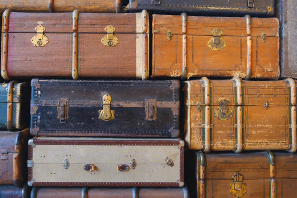 istock stack of vintage suitcases  - stack of old retro suitcases 948756346