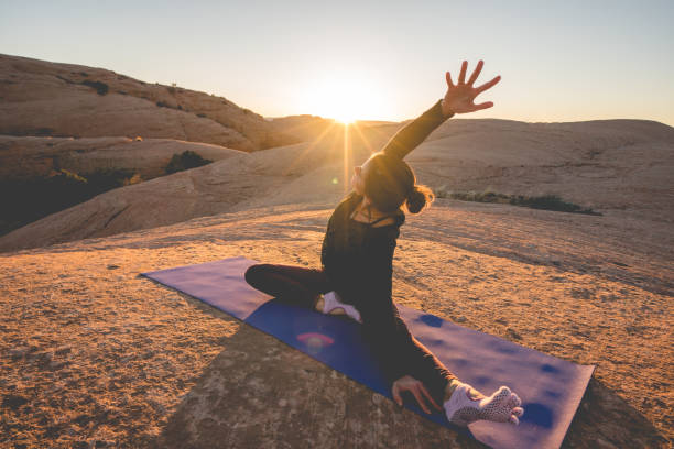 istock Woman Doing Outdoor Yoga in Moab 948772726