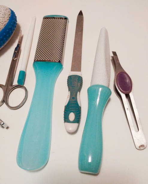 istock Beauty care pedicure tools, products, isolated on a white background. 948776024