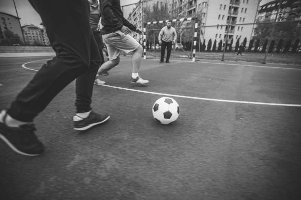 istock Men soccer game outdoors 948776084