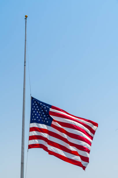 istock American flag at half mast after memorial services 948776442