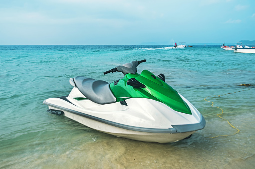 Jet ski on the beach. jet, ski, water motorcycle. the concept of marine entertainment in the summer at the seaside resort