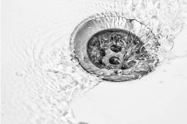 desagüe en el lavabo - sink fotografías e imágenes de stock