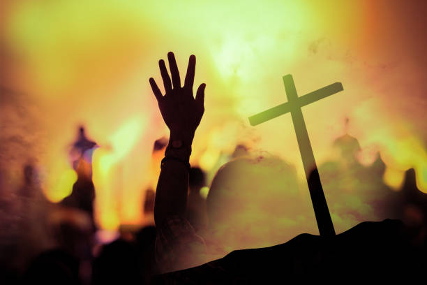 istock christian music concert with raised hand 948801166