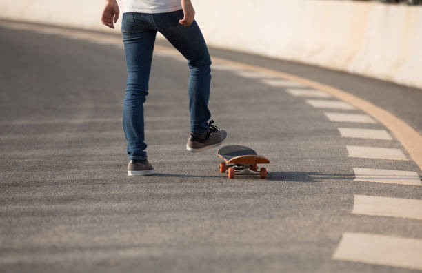 istock Skateboarder sakteboarding on highway 948801398