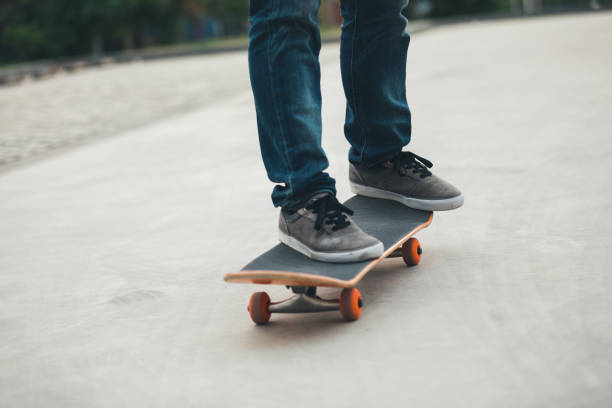 istock Skateboarder sakteboarding on parking lot 948803858