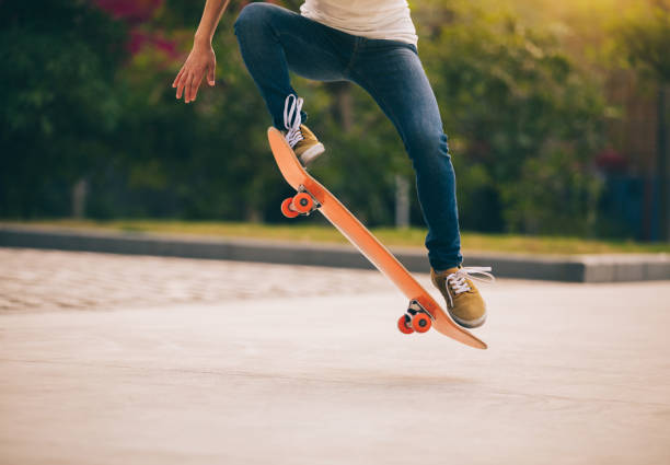 istock Skateboarder sakteboarding on parking lot 948803928