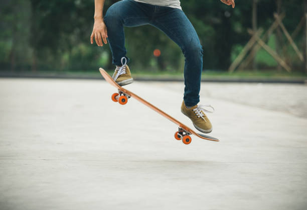 istock Skateboarder sakteboarding on parking lot 948804304