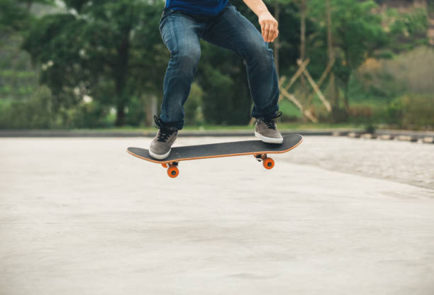 istock Skateboarder sakteboarding on parking lot 948804486