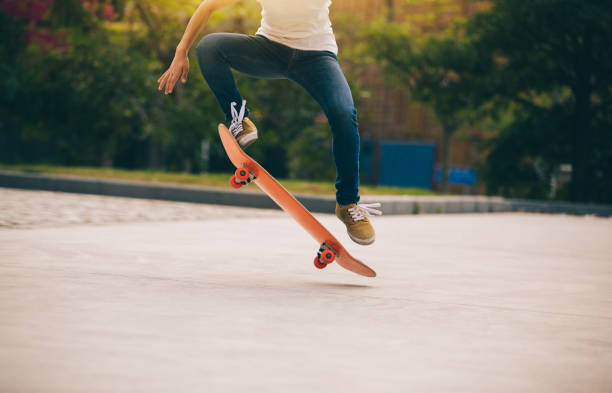 istock Skateboarder sakteboarding on parking lot 948809744