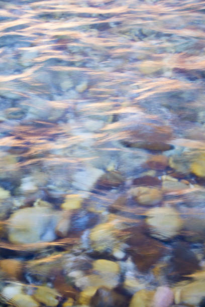 View of steps in the riverbed photographed from the shore